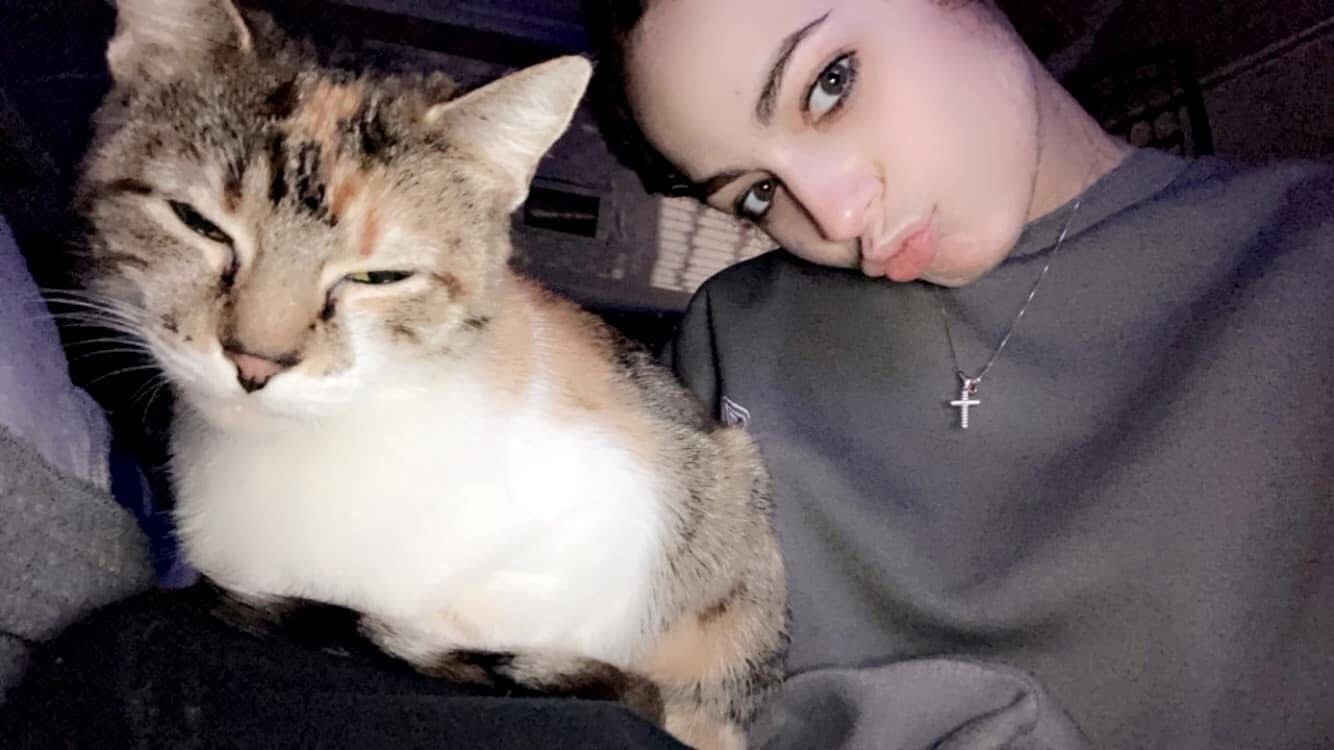 Brooklyn cuddling with the cat