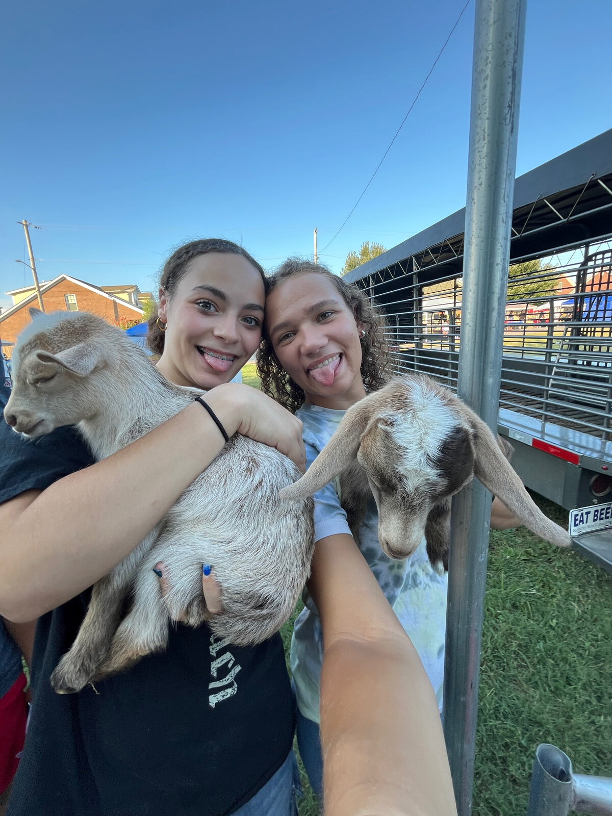 Brooklyn holding another baby goat