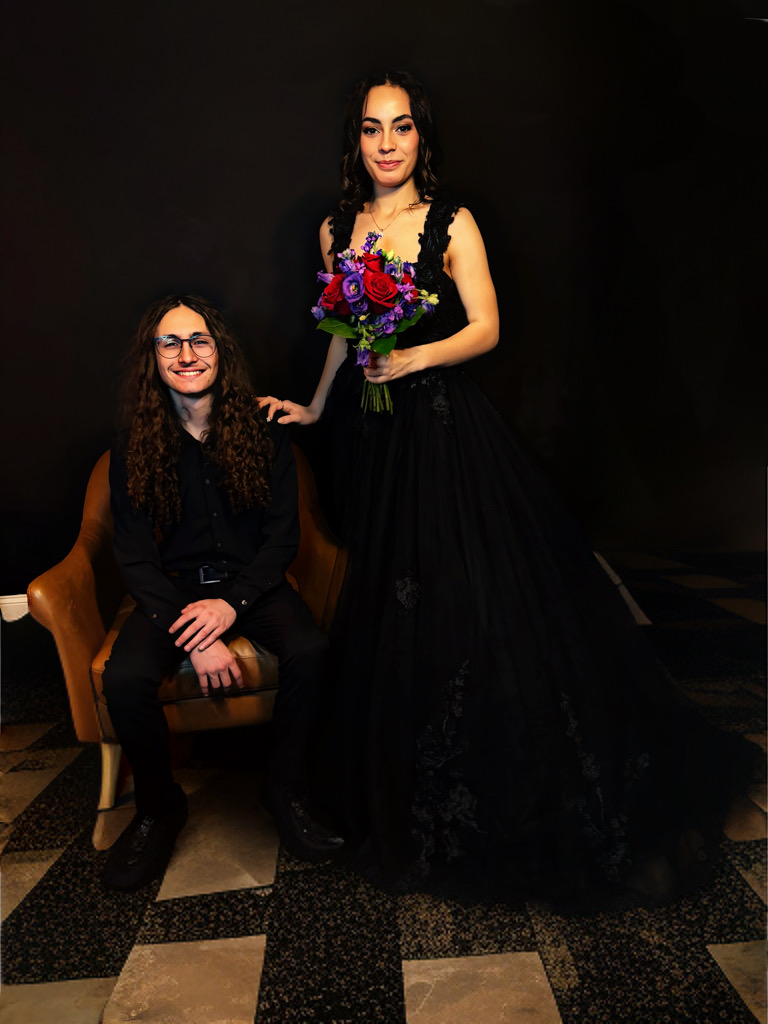 Brooklyn in her black gown with bouquet