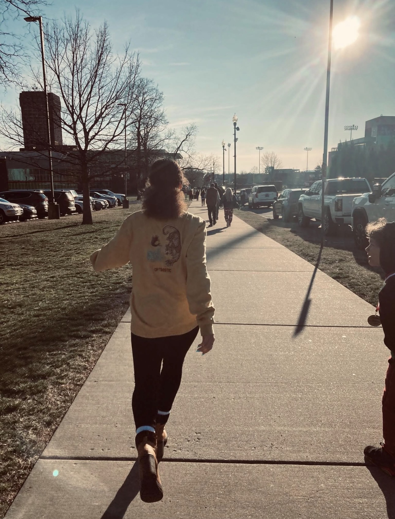 Brooklyn walking into the sun